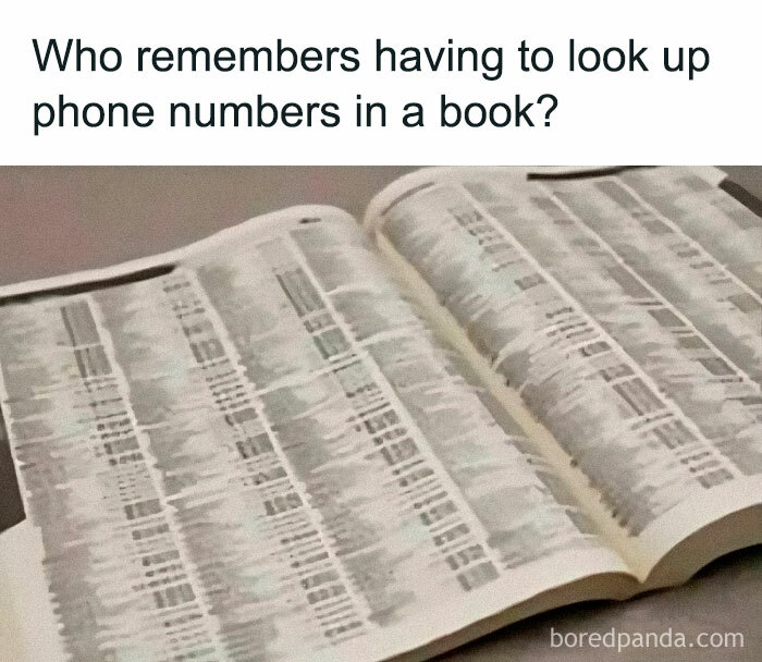 Open telephone book with phone numbers, nostalgic item representing ’80s and ’90s memories and retro communication methods.