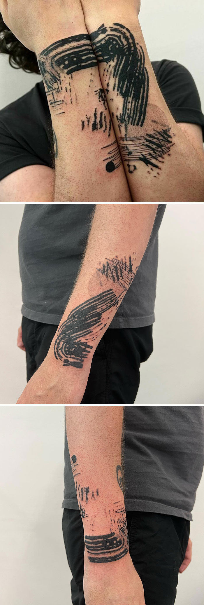 Unique tattoos with hidden meanings designed by a creative artist, featuring abstract black ink patterns on forearms.