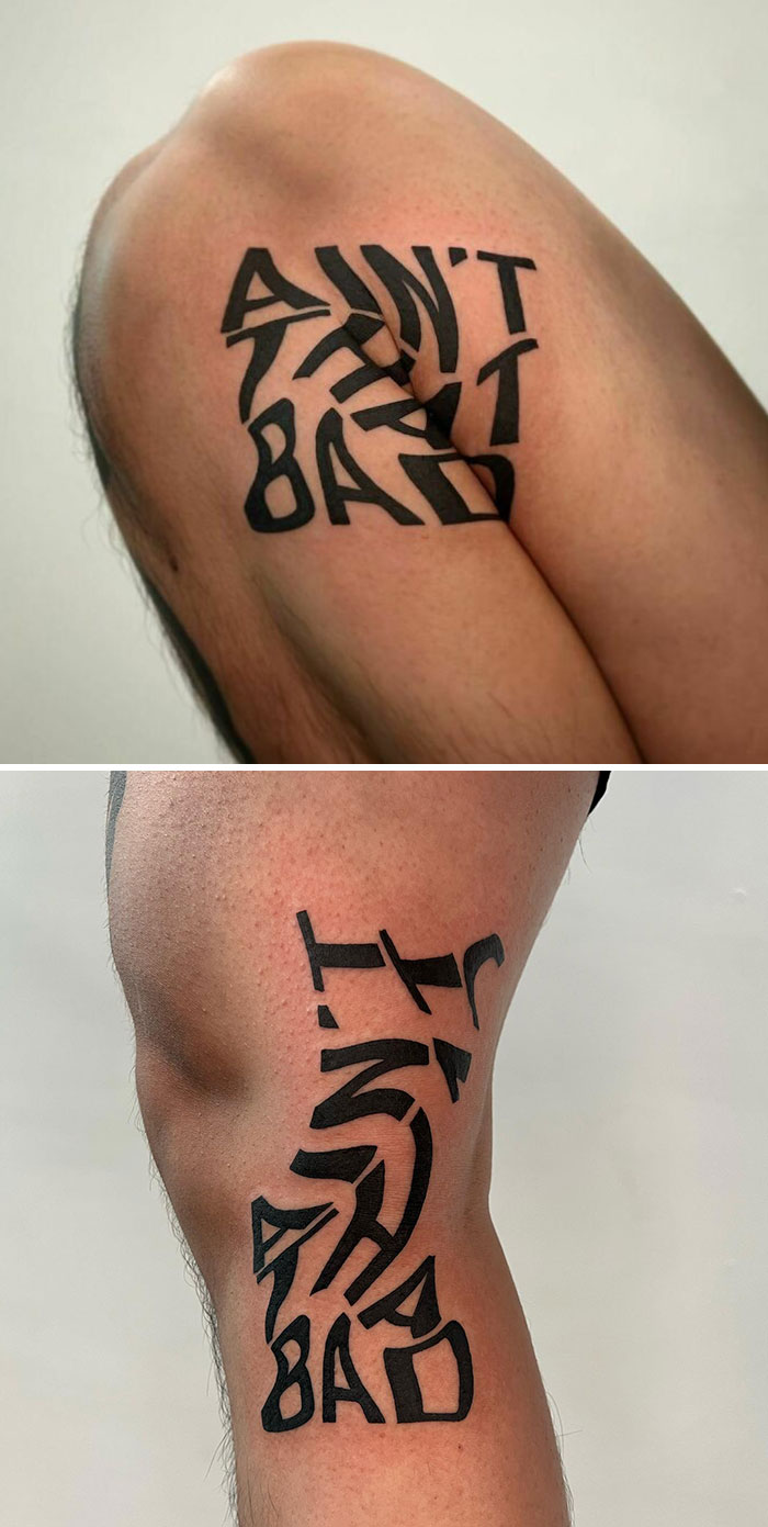 Creative tattoo with hidden meaning on a person's knee, featuring distorted black text.