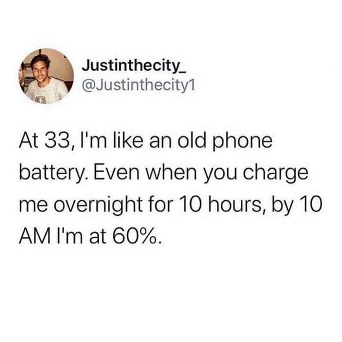 Funny meme about feeling tired like an old phone battery, perfect for times when you're not feeling very social.