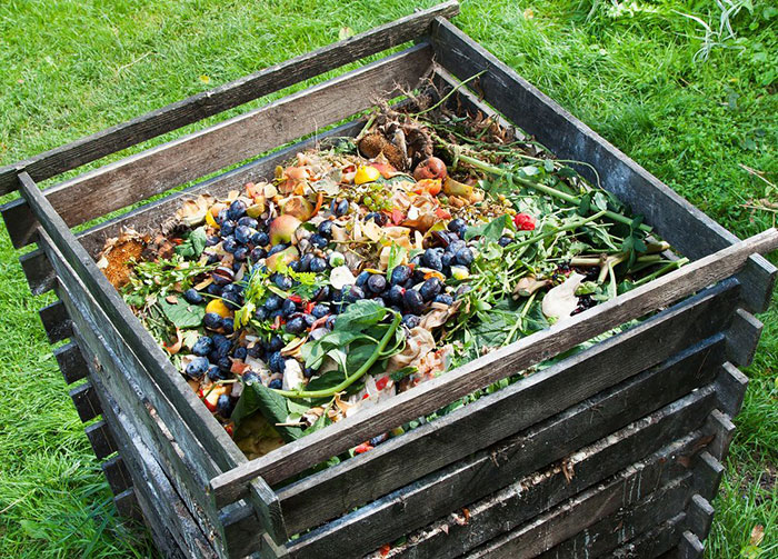 Compost box filled with materials Compost box filled with materials