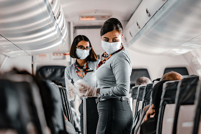 Dad Figures Out How To Make Woman On Plane Uncomfortable After She Refuses To Move Her Hair Away
