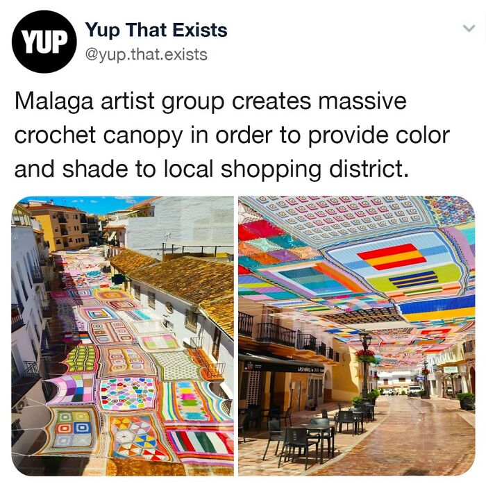 Colorful massive crochet canopy created by Malaga artists providing shade to local shopping district.