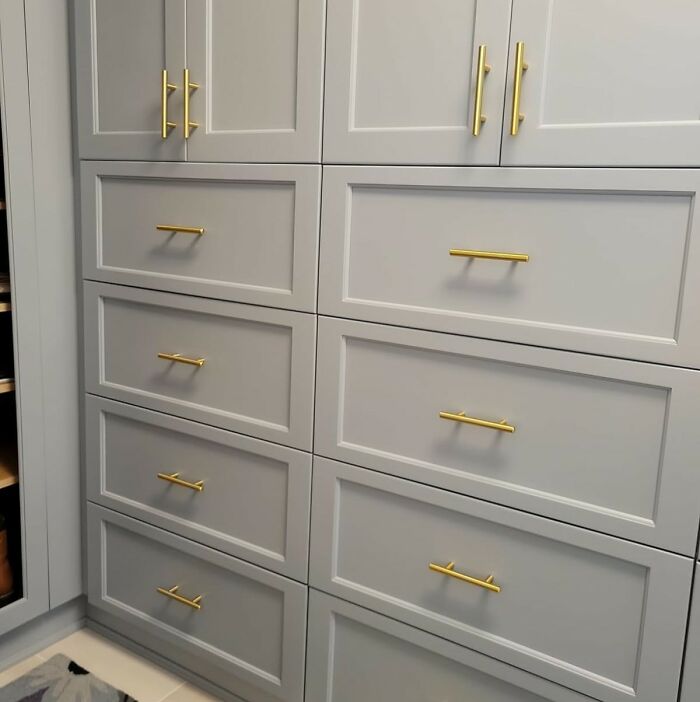 Gray shaker kitchen cabinets with gold handles, a simple upgrade to make kitchen feel like new