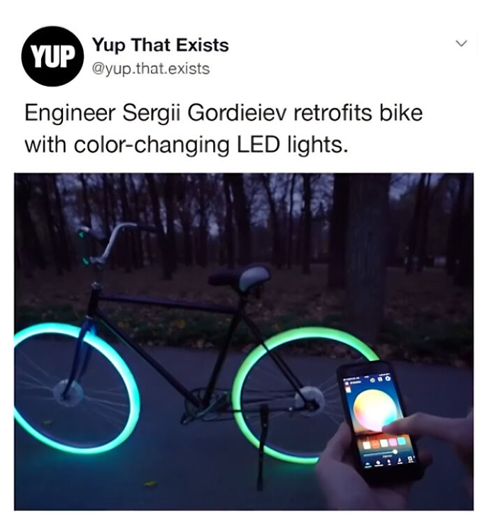 Bike with color-changing LED lights controlled by a smartphone app, showcasing a weird but real Yup That Exists innovation.