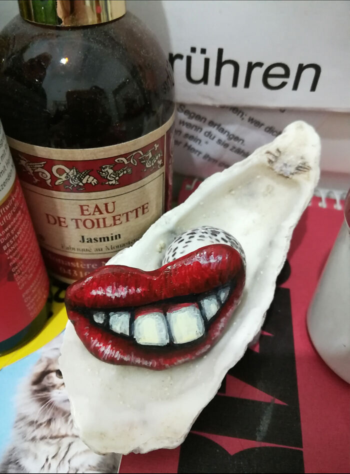 I Painted This Stone Like A Weird Mouth For A Friend. He Wanted To Hang It On A.tree, Together With Two Eyes And A Nose With The Same Style.so It Looks Like The Tree Has A Face