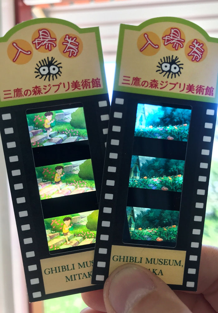 Two Ghibli Museum film strip tickets with animated scenes, showcasing Japan unique culture and creativity.