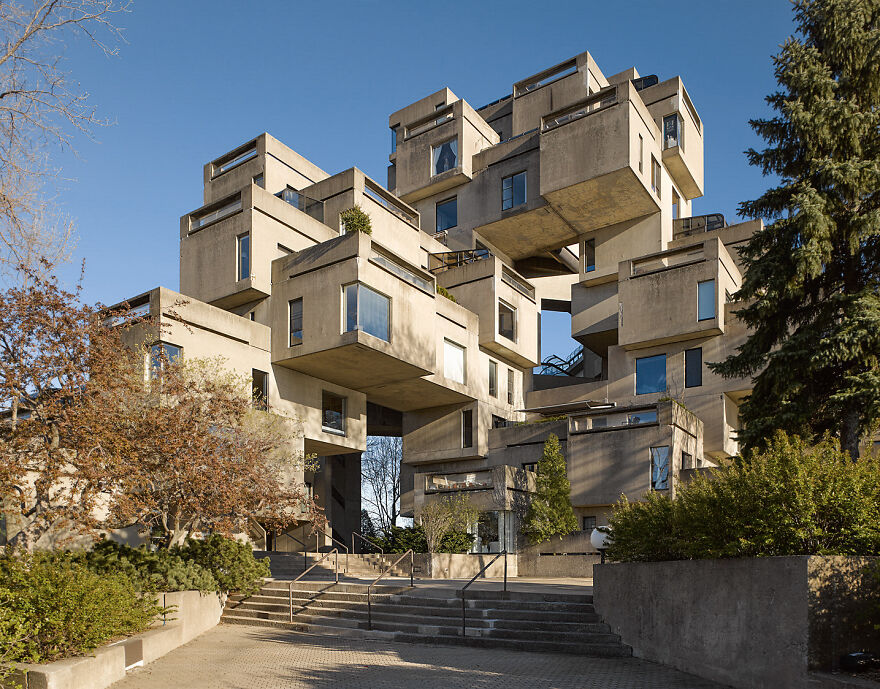 Habitat 67 Is A Housing Complex On The Saint Lawrence River In Montreal. Designed By Israeli-Canadian Architect Moshe Safdie, It Originated In His Master's Thesis In Architecture School, And Was Built For The 1967 Canadian World's Fair Called Expo 67. Safdie's Design Opened Up The Traditional High-Rise Apartment Building To Allow Natural Light Into All Four Sides Of A Dwelling And Gave Each Unit An Outdoor Garden Area, Almost Like A Single-Family House In The Sky