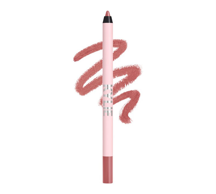 Pink lip liner pencil with swatch strokes behind it, representing top beauty brands setting the gold standard in 2024.