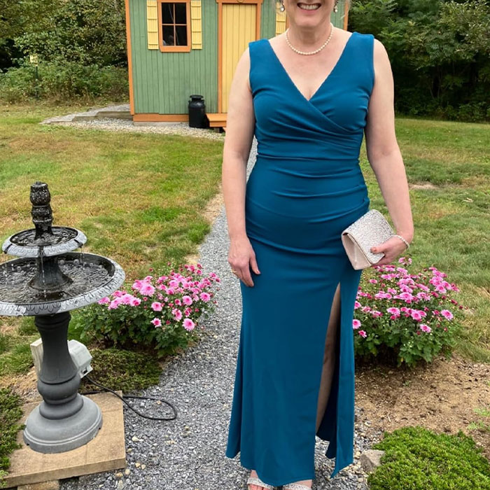 Evening Elegance Unleashed: Sleeveless V Neck Dress With A Chic Split!