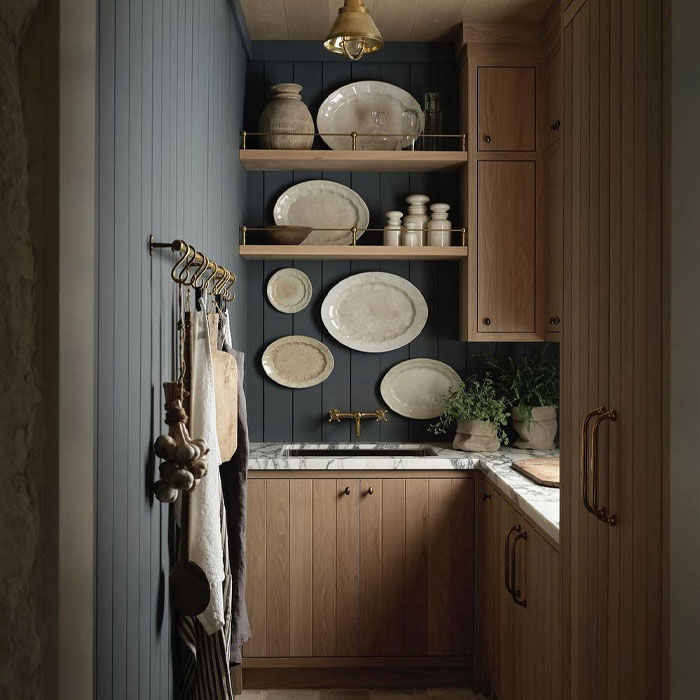 Small brown kitchen cabinets with sink