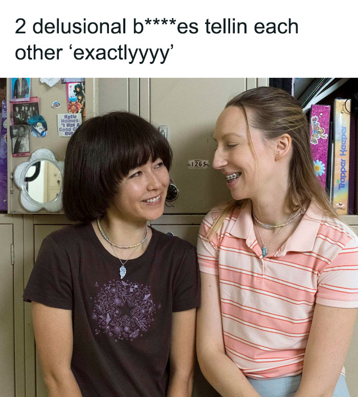 Two women laughing together in front of lockers, with humor text above, representing Meme Queen content.