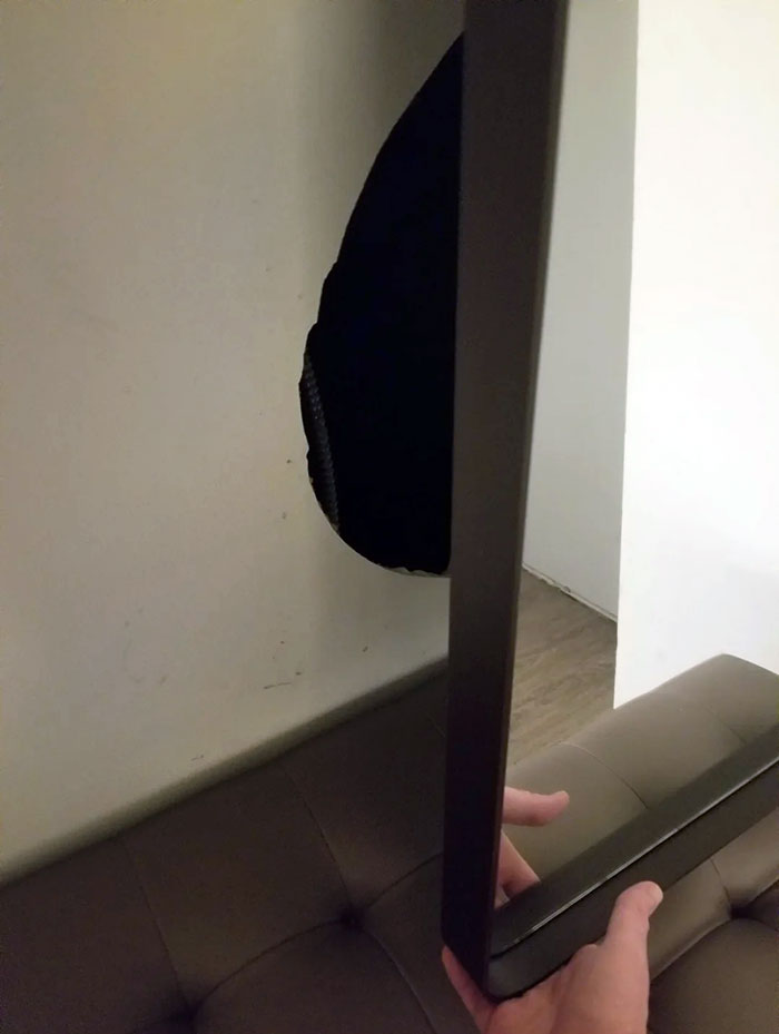 I Saw The Full Mirror In My Hotel Room Randomly Shake And Discovered This Space In The Wall Behind It