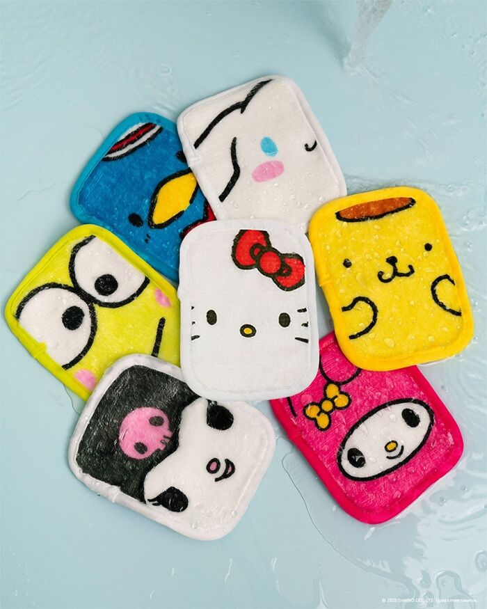 Colorful reusable makeup remover pads with cute character designs, representing top beauty brands in 2024 trends.
