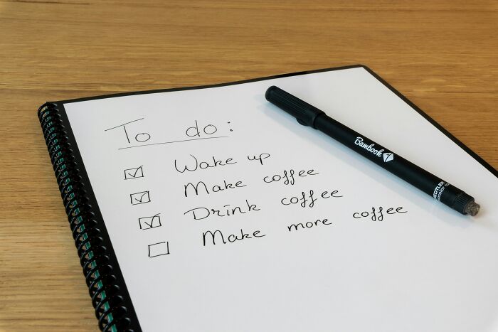 To-do list with checked tasks for waking up, making and drinking coffee, illustrating advice people tried after thinking it was a joke.