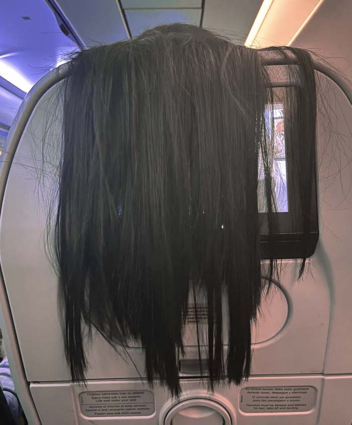 Trying To Watch A Movie On The Airplane