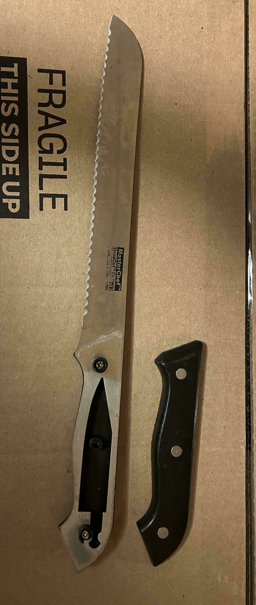 My Cheap Bread Knife Broke And Had A Paring Knife Cut Out Of The Tang