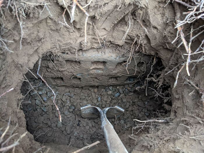 Burying Our Dog In The Backyard Who Passed Today At 16 And Came Across This Underground Wall