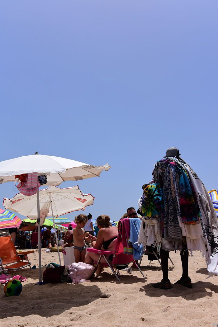 Sun, Sand, And Salesmen: 40 Pictures Of 'Looky Looky' Men And Other Beach Scenes