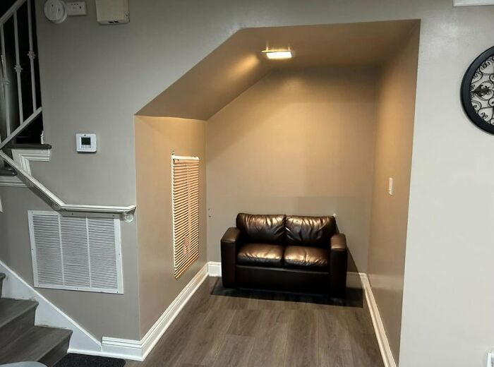 "Add A Leather Sofa And Some Mini Blinds"