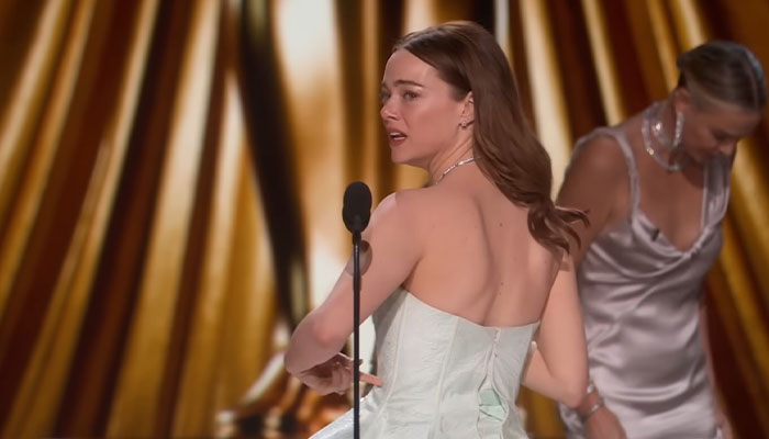 Emma Stone Accepts The Award For Best Actress—In A Ripped Louis Vuitton Gown