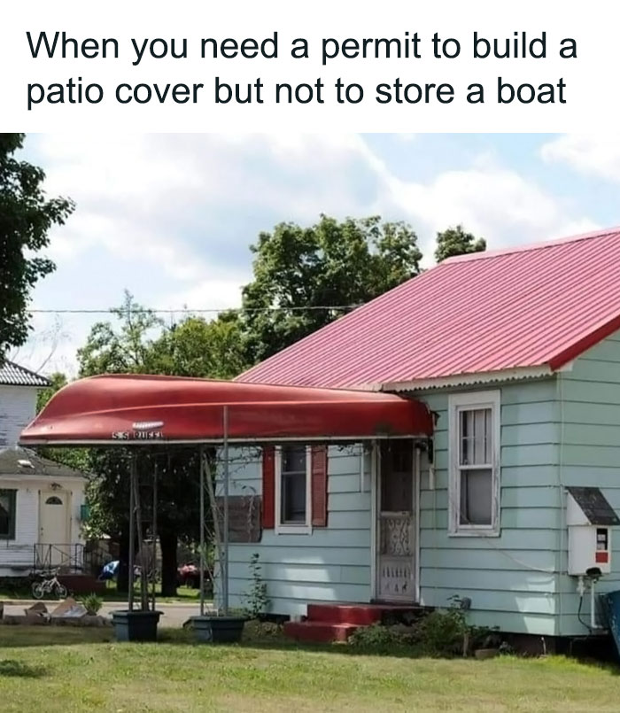 House with a red roofed boat storage acting as a patio cover, highlighting absurd urban planning.