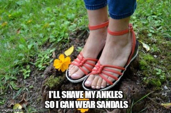 Feet in red sandals on grass with spring flowers, caption about shaving ankles for sandal season.
