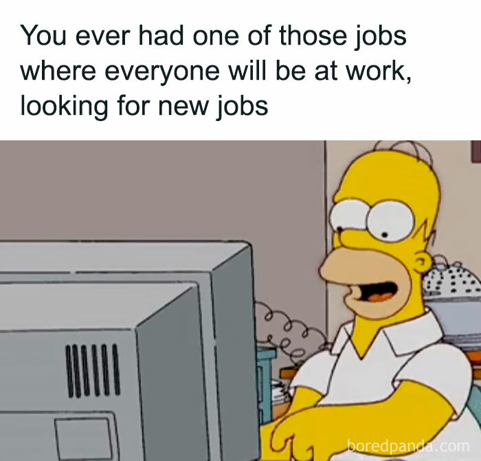 Cartoon character smiling at a computer, with text about searching for new jobs at work. Funny work meme theme.