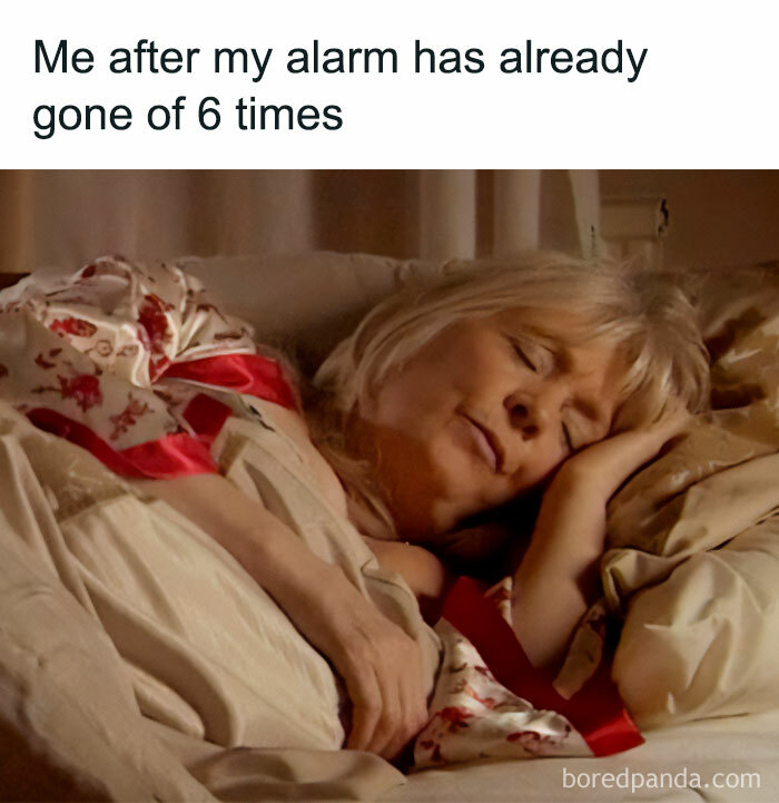 Sleeping woman in bed, caption reads: "Me after my alarm has gone off 6 times," representing funny work memes.