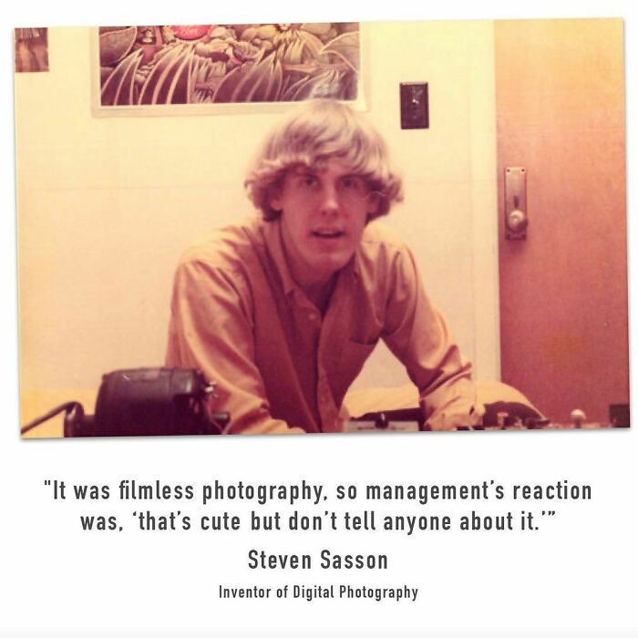 Young man in vintage setting discussing early challenges of digital photography in interesting vintage newspaper clippings.
