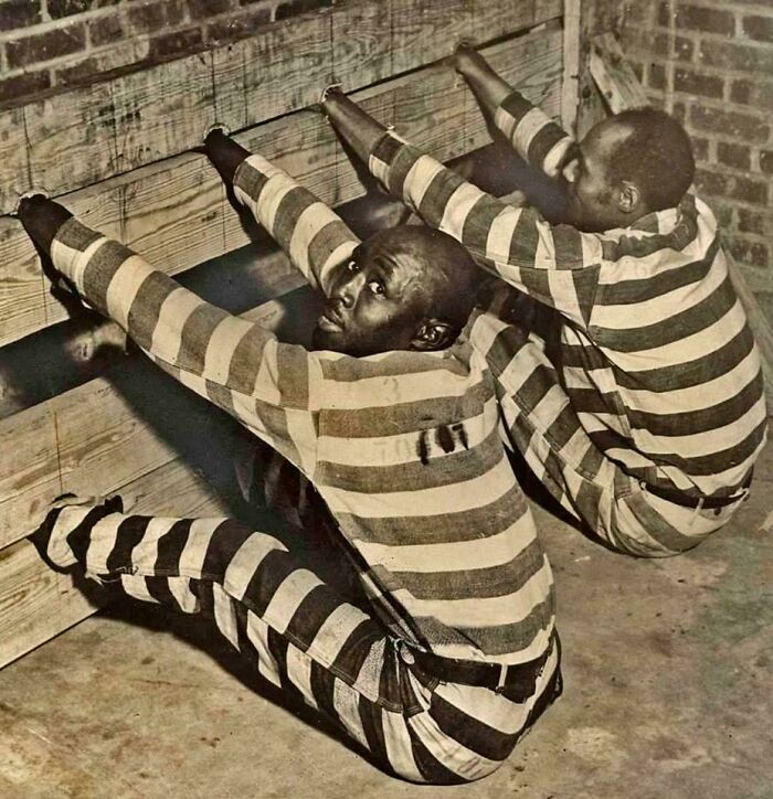 Two Men In A Pillory At The State Prison Of Bibb County, Georgia, 1937