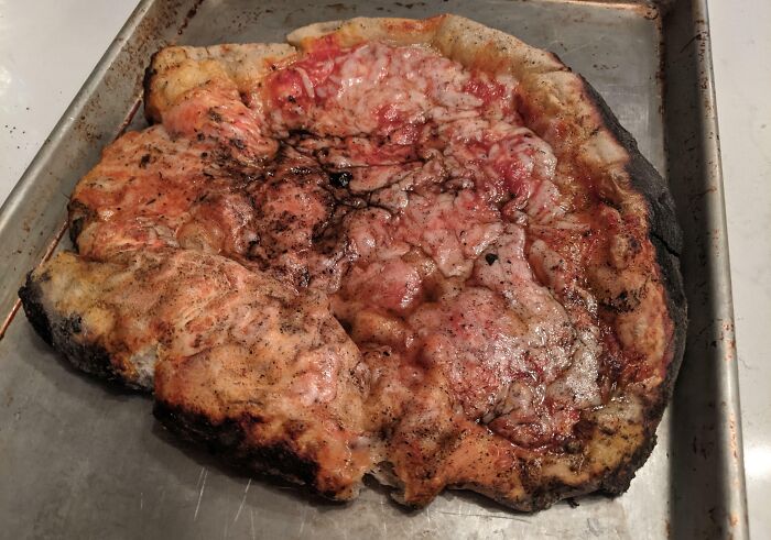 Our Airbnb Had A Brick Oven. We Tried Making Pizza