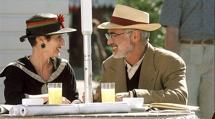 In The Truman Show (1998), The Couple At The Table Are Daryl Davis And Robert Davis, They Are The Founders Of Seaside, The Town Where The Movie Was Filmed. They Agreed To Give Filming Permission, In Return For A Cameo