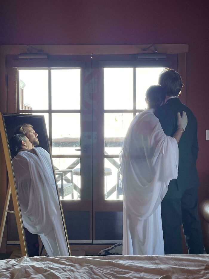 A Cellphone Shot Through Glass Doors Of My Friends On Their Wedding Day