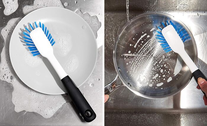 Cleaning brush used on a soapy plate and pan, showcasing lazy ways to deep clean your home.