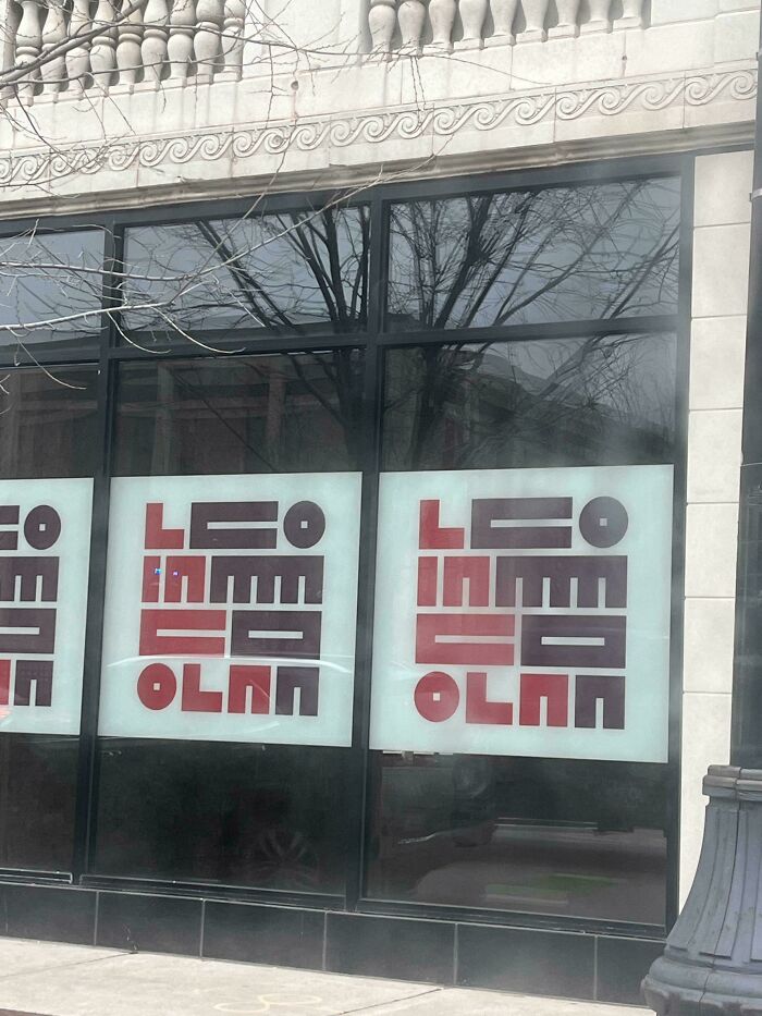 Unclear window signs with red and black letters illustrating sign fails.