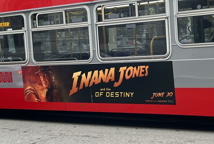Bus advertisement with "Inana Jones" typo, highlighting a hilarious job fail.