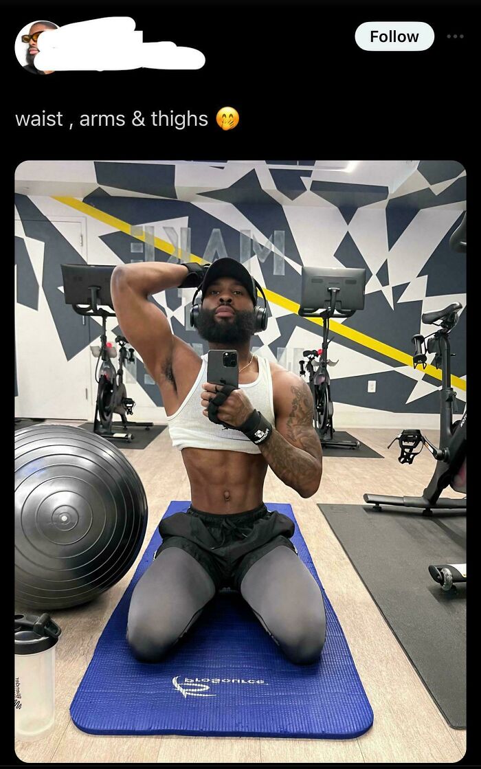 Man with toned abs taking a gym selfie on a blue mat, illustrating Instagram vs reality fitness moments.