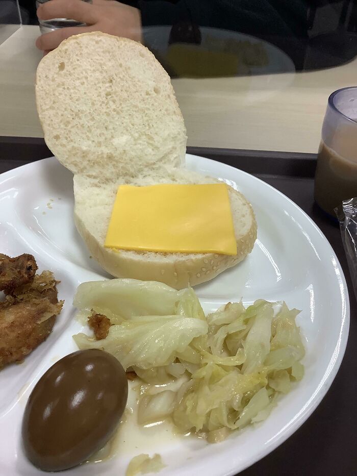 I Present My School's Breakfast “Cheese Burger,” Just Cheese And Bun. This Is In Taiwan