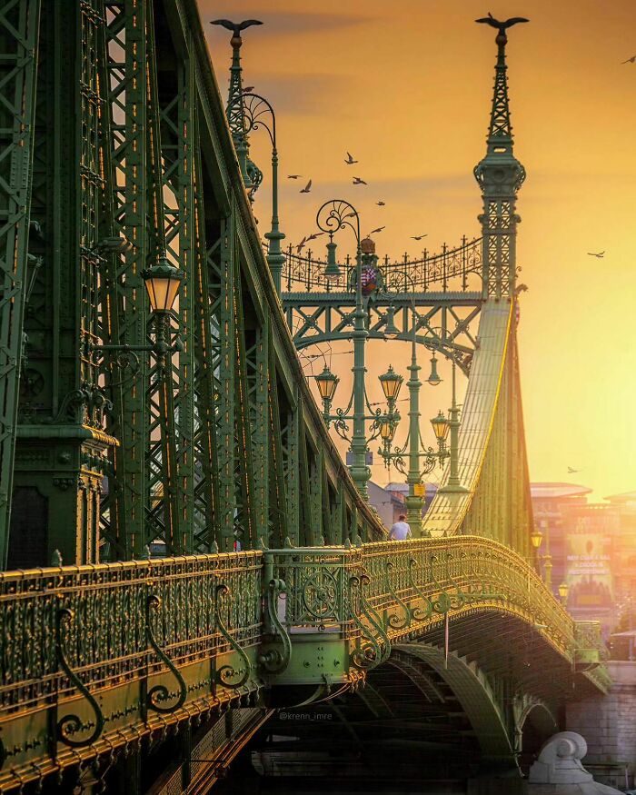 The Art Nouveau Style Liberty Bridge Crossing The Danube In The Morning Sunlight, Budapest, Hungary. Originally Built In Late 19th Century, Rebuilt After World War II