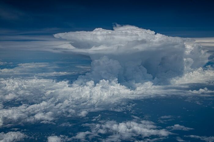 Aerial photo of dramatic cloud formations taken by a pilot showcasing breathtaking views from high above the earth.