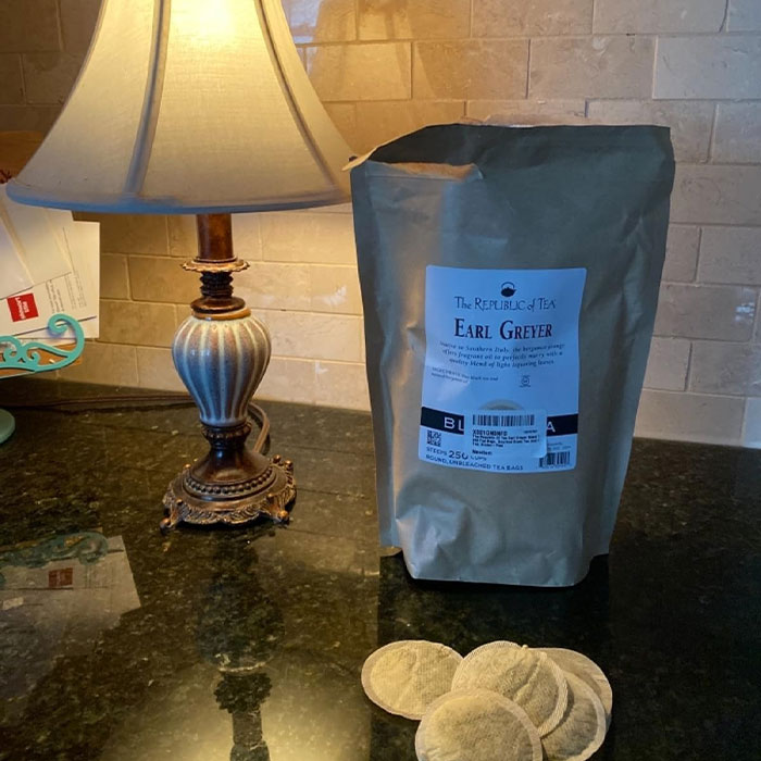 Earl Grey tea, milk being poured into a glass, creating a soothing drink. Perfect cheap and cheerful Mother’s Day gift.