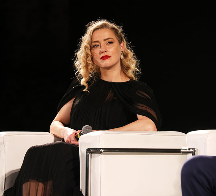 Amber Heard Poses With Champagne Glass In Rare Photo Following Move And Name Change