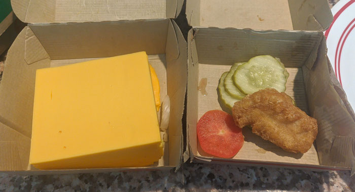 My Sister Just Got A Job At McDonald's. I Pull Up In The Drive-Through and Order One McChicken. I Get Handed A Super Heavy Bag, Drive Home All Excited And Then See This. No McChicken Either