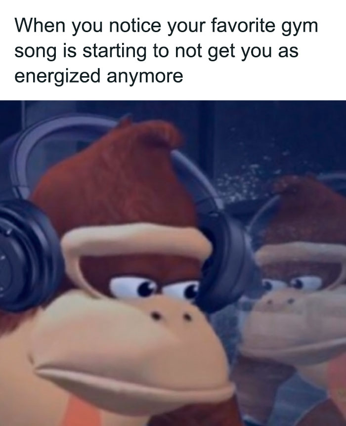 Cartoon gorilla wearing headphones with a caption about a favorite gym song losing its energy boost.