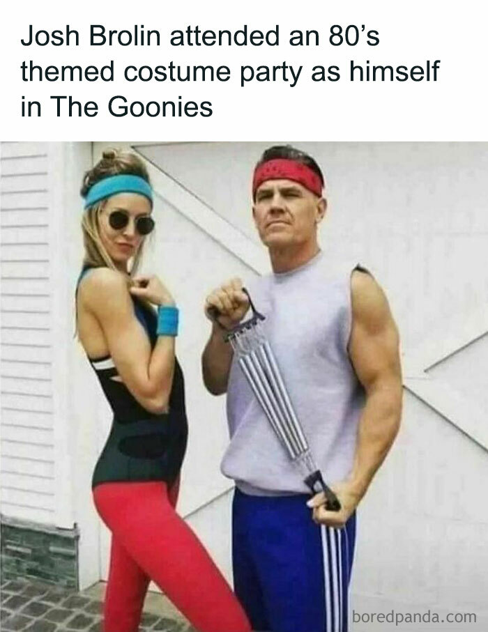 Two people at an '80s costume party, one holding a workout band, evoke funny '80s memes nostalgia.