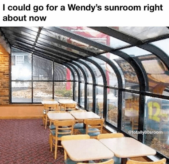 '80s nostalgia meme of a vintage Wendy's sunroom with empty tables and chairs.