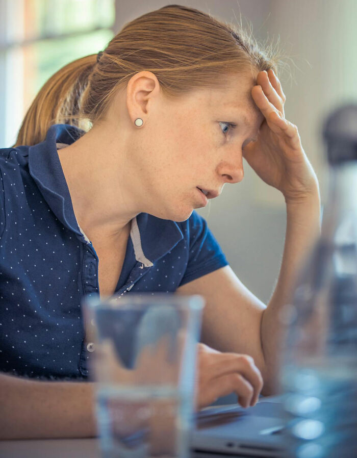 A person in a blue shirt looking frustrated, which may relate to hilariously unfortunate baby names. - 5