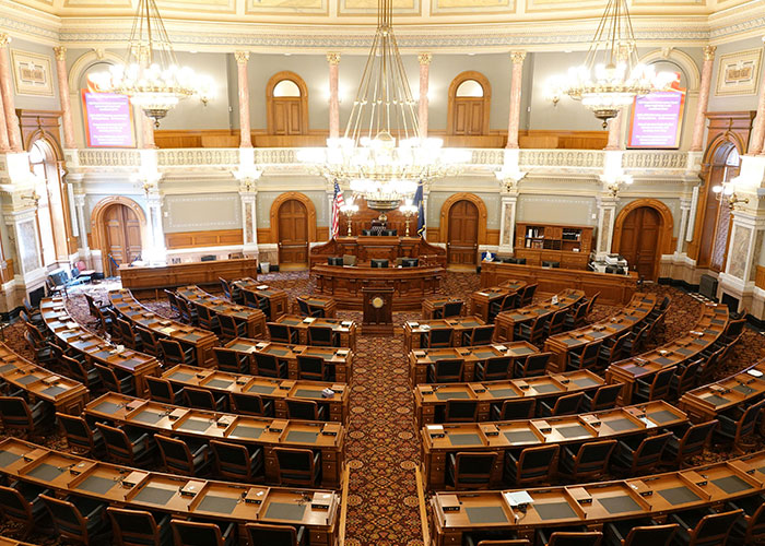 Luxurious ornate chamber with elegant wood desks and grand chandeliers highlighting wildest things the rich can purchase.