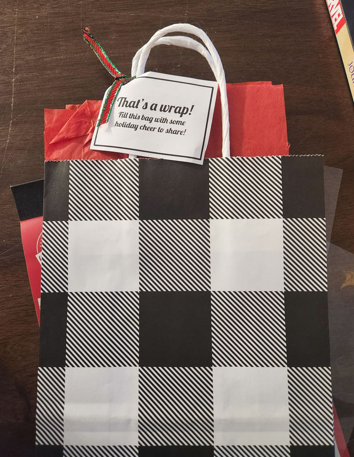 Little "Gift" My Wife Got One Year At Work. It's Literally Just An Empty Gift Bag